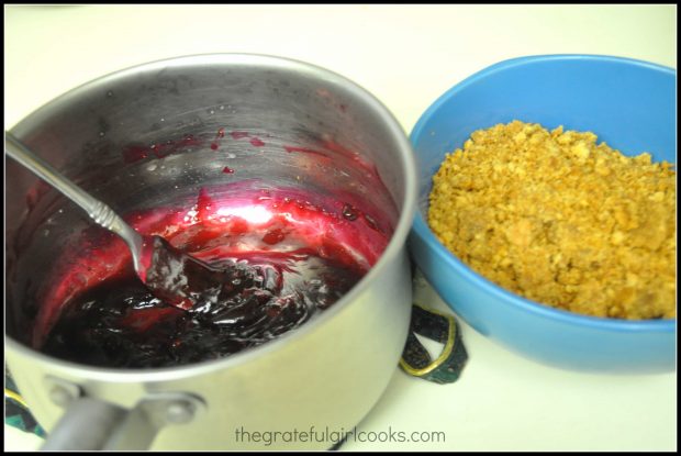 The blueberry sauce and graham cracker crust mix are ready to use.