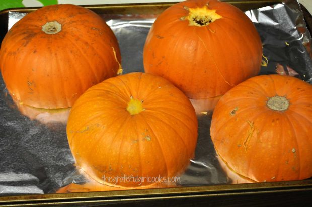 Pie pumpkins are roasted in oven until tender, before making pumpkin puree.