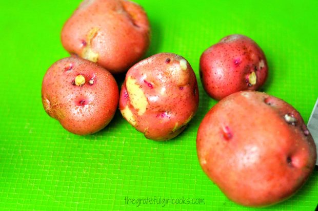 Red potatoes are used for this recipe after cleaning.