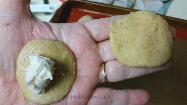 Another flattened piece of cookie dough will go on top of the filling.