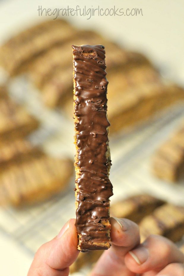 The bottom of each piece of biscotti is brushed with melted chocolate.