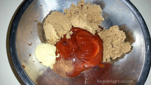 The ingredients for the BBQ sauce for the meatloaf are put into a bowl for mixing.