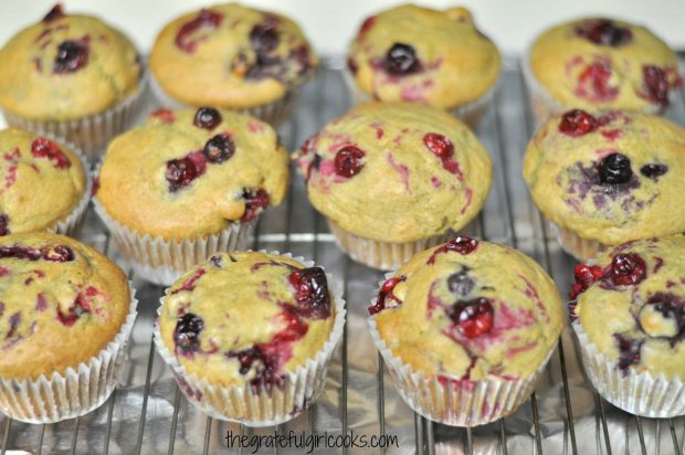 Cranberry orange muffins, cooling on wire rack after baking.