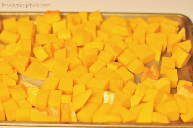 Roasted butternut squash requires squash cubes, tossed in olive oil.