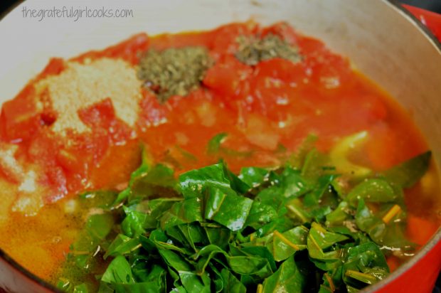 Canned tomatoes, sherry, broth spices and Swiss chard are added to the sundowner soup.