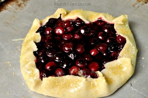 Blueberry Galette crust sprinkled with sugar, on baking sheet