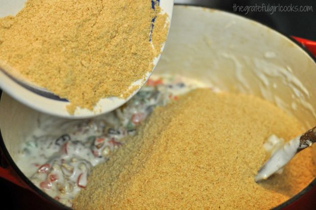 Finely ground graham cracker crumbs added to the fruitcake mixture in pan.