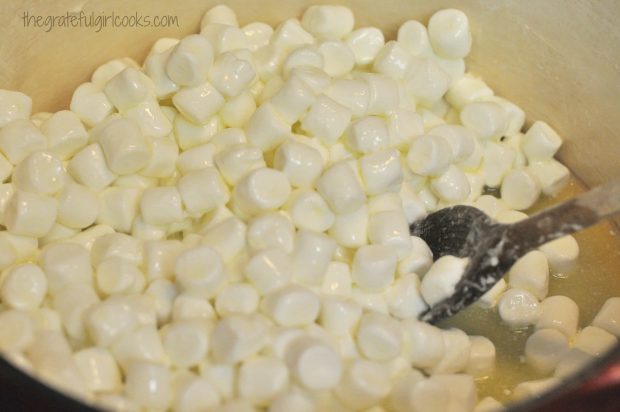 Miniature marshmallows are melted into the melted butter.