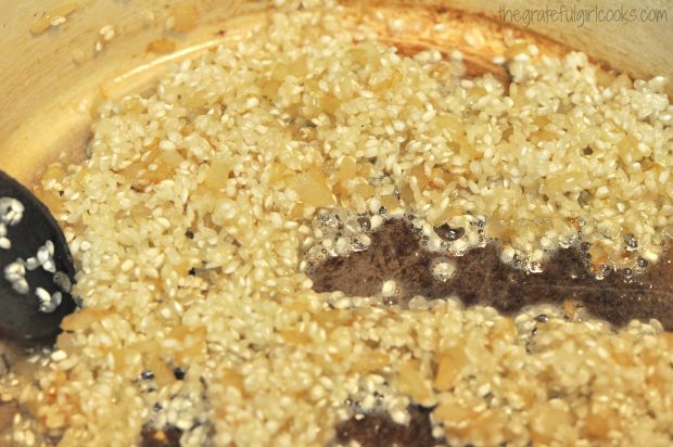 Onions and arborio rice being cooked for mushroom risotto