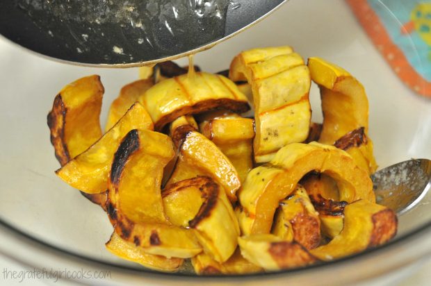 Roasted Delicata Squash is combined with the maple sage sauce before serving.