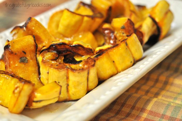 Close up picture of the roasted delicata squash on serving platter.