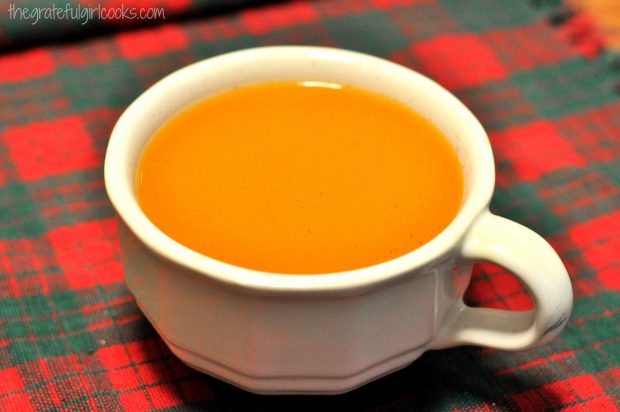 A delicious beverage made with spiced tea mix, in a white mug.