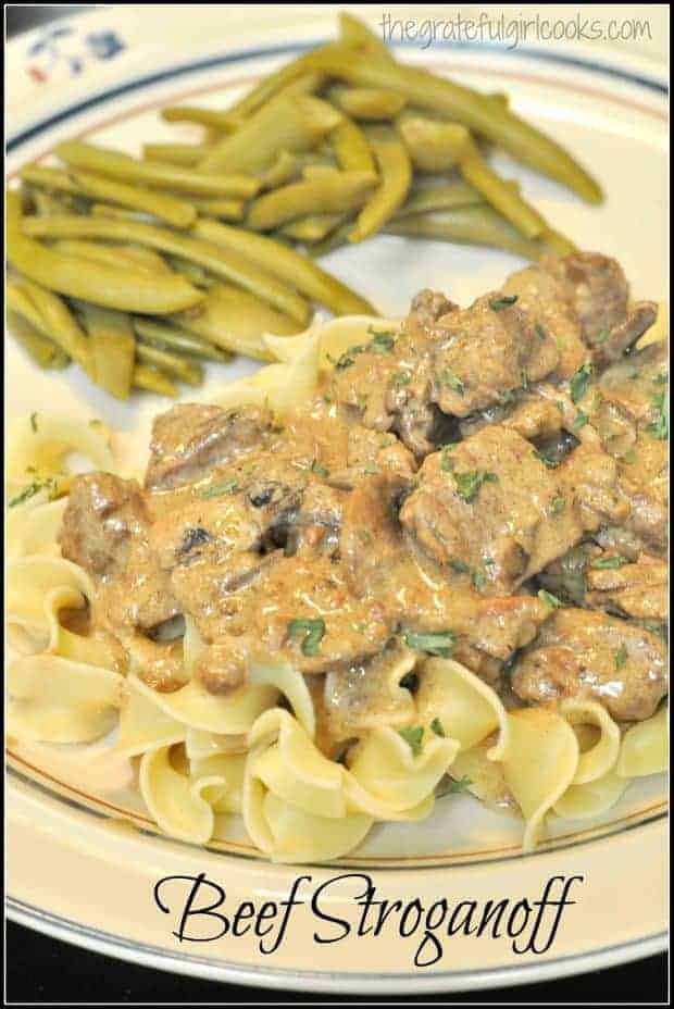 Beef Stroganoff is a delicious classic dish, featuring tender strips of beef in seasoned beef/mushroom/onion/sour cream sauce, and served over egg noodles.