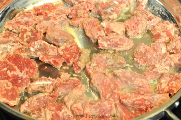 Browning stew meat in skillet