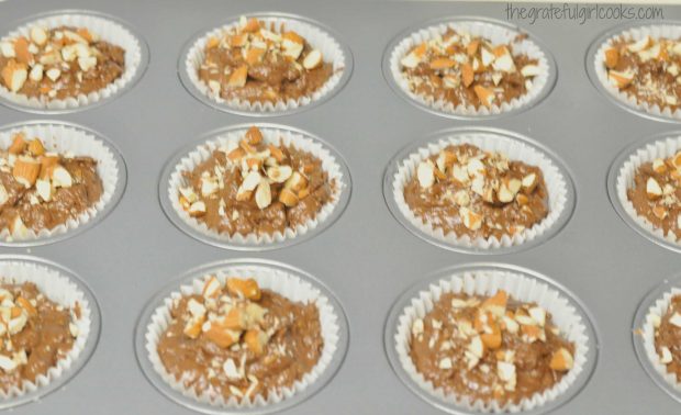 Chocolate almond chia muffins batter in muffin cups, are ready to bake!