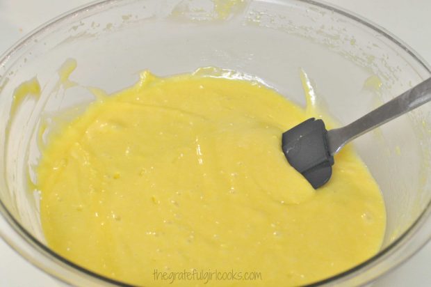 Batter for Mom's lemon jello cake is mixed together in bowl.