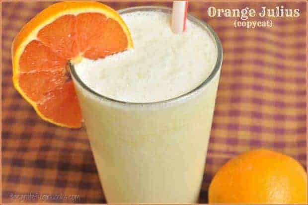 You'll enjoy this Orange Julius copycat recipe for the famous cold, creamy, frothy orange drink! EASY and quick to make smoothie, with only a few ingredients!