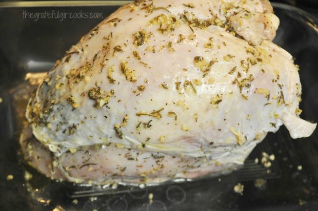 Roast turkey breast with herbs and garlic is ready for the oven.