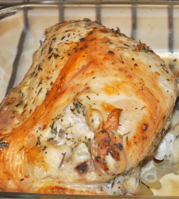 Roast turkey breast is golden brown after baking.