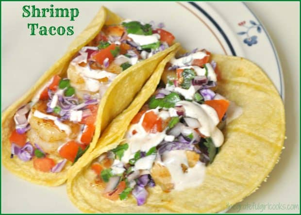 Make these delicious pan-seared shrimp tacos with homemade pico de gallo, topped with a creamy salsa verde sour cream sauce in a snap!