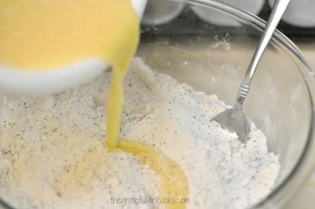 Pouring egg mixture into dry ingredients in bowl