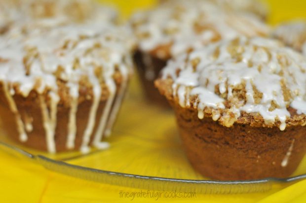 Once glaze has been drizzled on the lemon coffee cake muffins, they are ready to eat.
