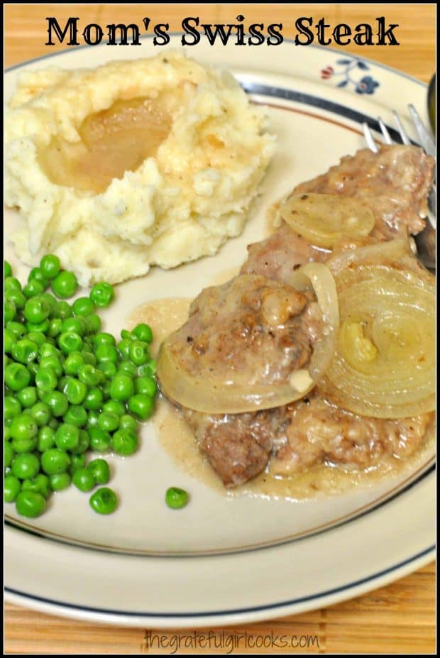 Mom's Swiss Steak is comfort food at it's very BEST! Sliced round steak with a flavorful onion gravy, and baked until tender. Economical and delicious! 