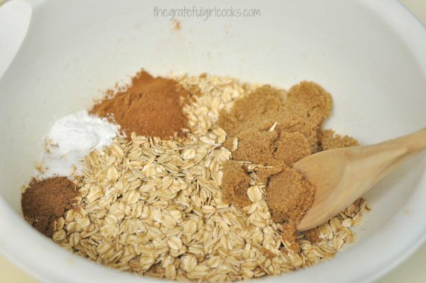 Rolled oats and spices in white bowl