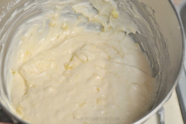 Making the cream cheese frosting in a bowl, for Edie's carrot cake.