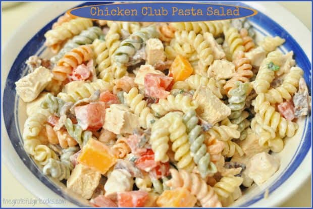 Chicken Club Pasta Salad is a delicious, filling, chilled salad with rotini pasta, chicken, bacon, tomato, cheese, etc. in a creamy homemade ranch dressing.