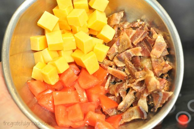 Cheddar cheese, tomatoes and cooked bacon for chicken club pasta salad