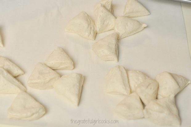 Each piece of biscuit dough for the monkey bread minis is cut into 6 pieces