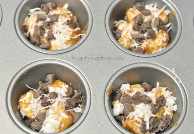 Chocolate chips and coconut are added to monkey bread minis.