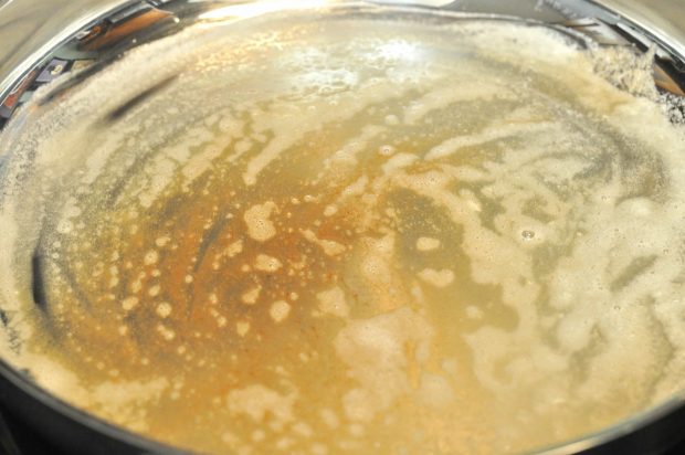 Butter is melted, then browned in a large skillet.