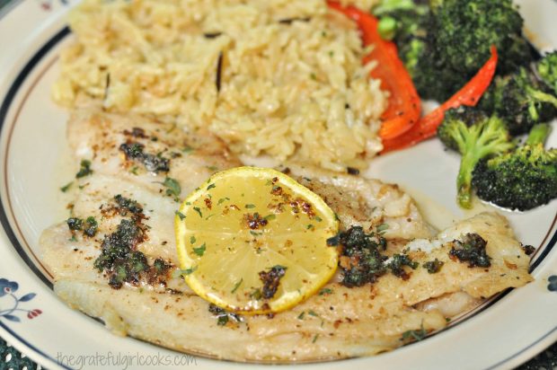 Dover sole in a browned butter lemon sauce, served with rice pilaf and broccoli.