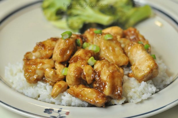 Easy cashew chicken is served on a bed of rice.
