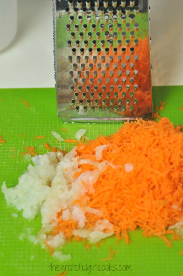 Onion and carrot is shredded for Hawaiian macaroni salad.
