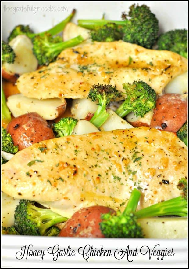 Honey garlic chicken breasts are baked in a honey garlic sauce, with red potatoes and broccoli in this delicious, easy one pan dinner!