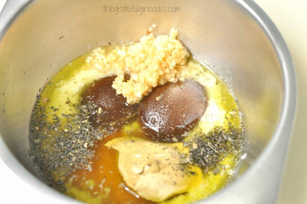 Honey garlic sauce ingredients in metal bowl