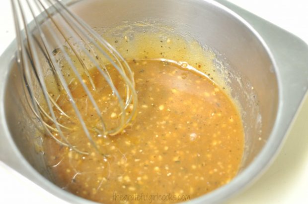 Whisking the sauce for honey garlic chicken. 