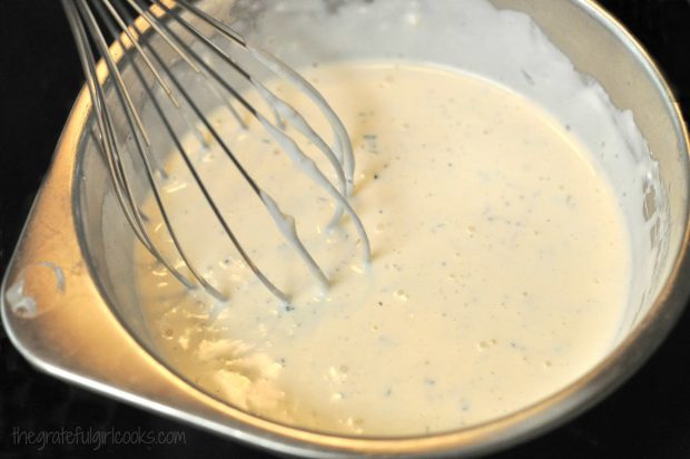 Homemade ranch dressing is whisked together and is now ready to drizzle on green salads!