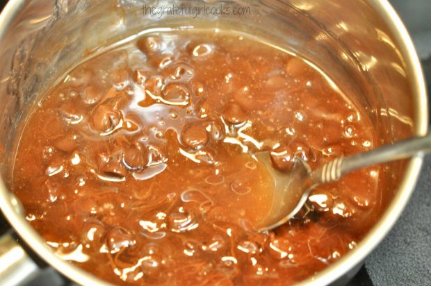 Chocolate is only melted part way for filling for chocolate pecan pie bars.