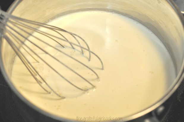 Milk and half and half are heated to make coffee creamer.