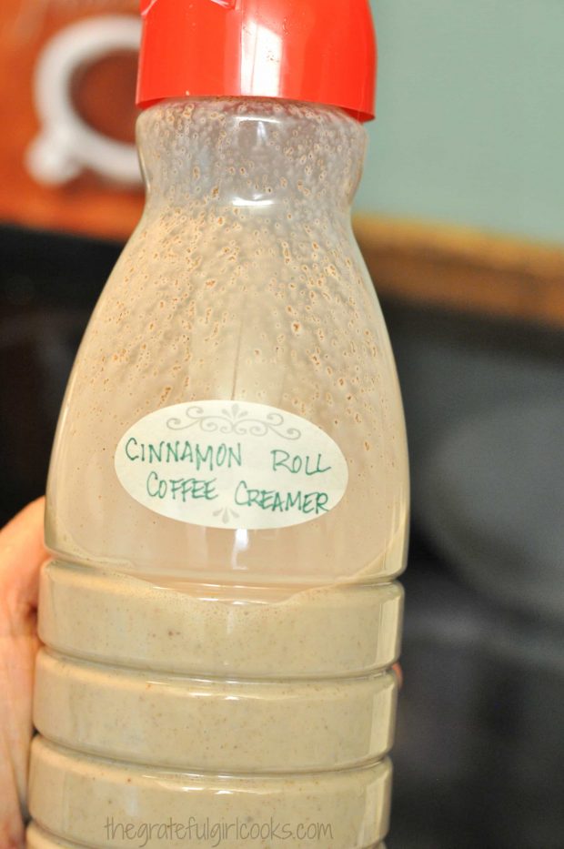 Cinnamon roll coffee creamer in a plastic bottle.