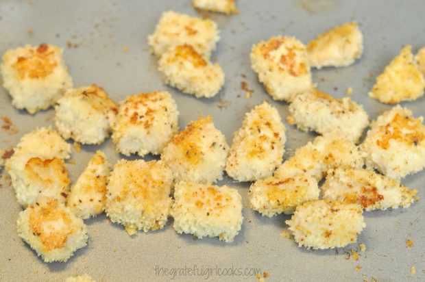Chicken pieces are crispy and golden brown after baking.