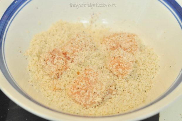 Chicken breast cubes are coated in the seasoned panko breadcrumbs.