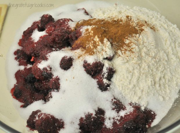 Boysenberries are tossed with flour, sugar and cinnamon.