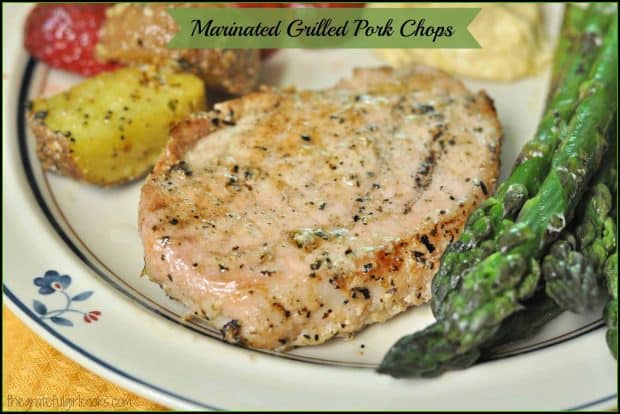 Marinated grilled pork chops feature thick boneless chops, seasoned in a light lemon juice, olive oil and herb marinade, then grilled to delicious perfection!