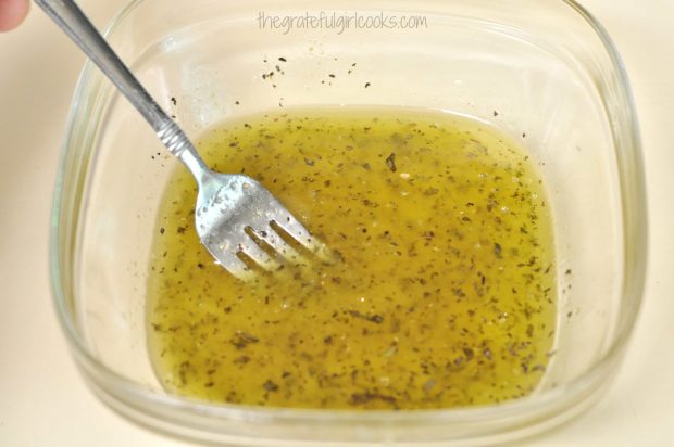 Marinade is blended with a fork for pork chops.