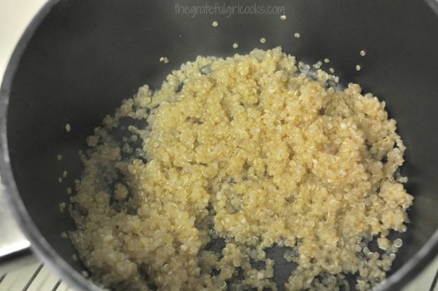 Fluffy cooked quinoa is ready to use in the shrimp quinoa veggie bowl.